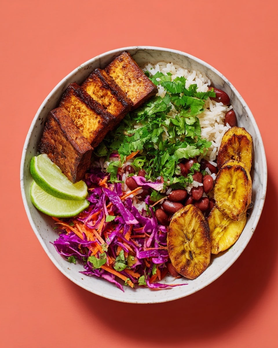 A white bowl contains a colorful rice and beans base with white rice and red kidney beans, topped with bright green cilantro leaves scattered across. On one side, there are five thick slices of grilled tofu stacked at an angle, with a golden brown grilled texture. Adjacent to the tofu is a vibrant purple cabbage slaw mixed with thin orange carrot sticks and small green scallions, with more cilantro on top. Three golden-brown fried plantain slices with slightly caramelized edges are placed next to the slaw. Two lime wedges sit on the edge of the bowl, adding a pop of fresh green. The bowl is set on a white marbled surface. photo taken with an iphone --ar 4:5 --v 7