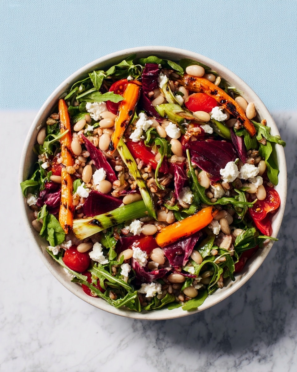 A colorful salad fills a white bowl placed on a white marbled surface, showing a mix of fresh and cooked ingredients. The base layer has green arugula leaves and pieces of deep purple radicchio, scattered with creamy white beans and small chunks of light brown grains. On top, there are bright orange roasted carrot sticks and grilled slices of dark-edged green leek adding texture. Red bell pepper chunks and halved cherry tomatoes add more vibrant red hues, while small dollops of soft white cheese dot the salad, giving a creamy contrast to the fresh vegetables. photo taken with an iphone --ar 4:5 --v 7