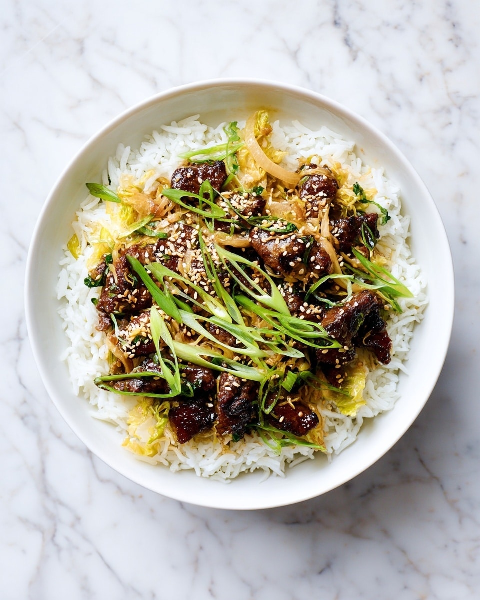 A white bowl holds a dish with two main layers: on the bottom is a bed of fluffy white rice, and on top is a mix of dark, glazed beef pieces and light golden-brown sautéed cabbage, all sprinkled with small, toasted sesame seeds. Thin green strips of scallions are scattered over the top, adding a fresh touch. The bowl is placed on a white marbled surface with a soft natural light coming from above. Photo taken with an iphone --ar 4:5 --v 7